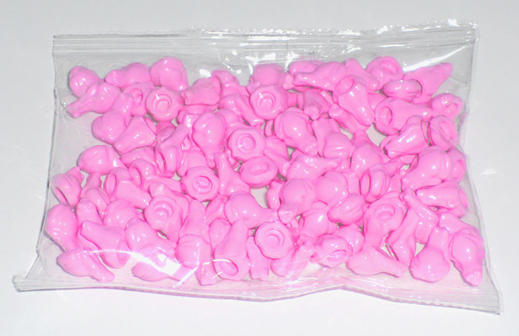 bag full of pink frogs