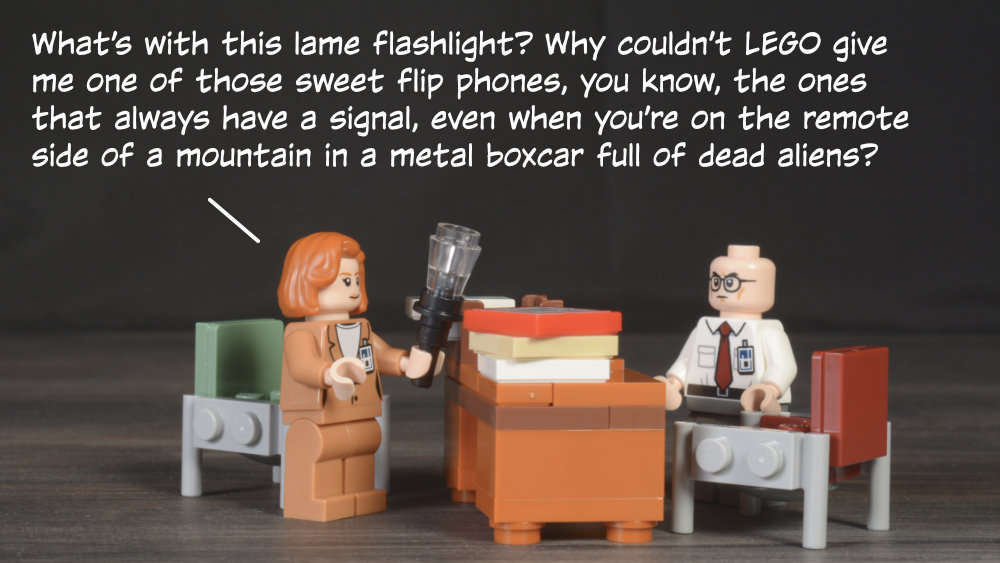 Scully: What’s with this lame flashlight? Why couldn’t LEGO give me one of those sweet flip phones, you know, the ones that always have a signal, even when you’re on the remote side of a mountain in a metal boxcar full of dead aliens?
